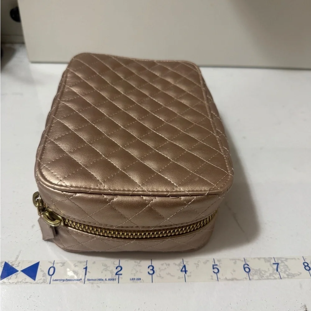 Trish McEvoy Makeup Planner.Quilted Metallic Rose Gold Travel Jewelry and makeup